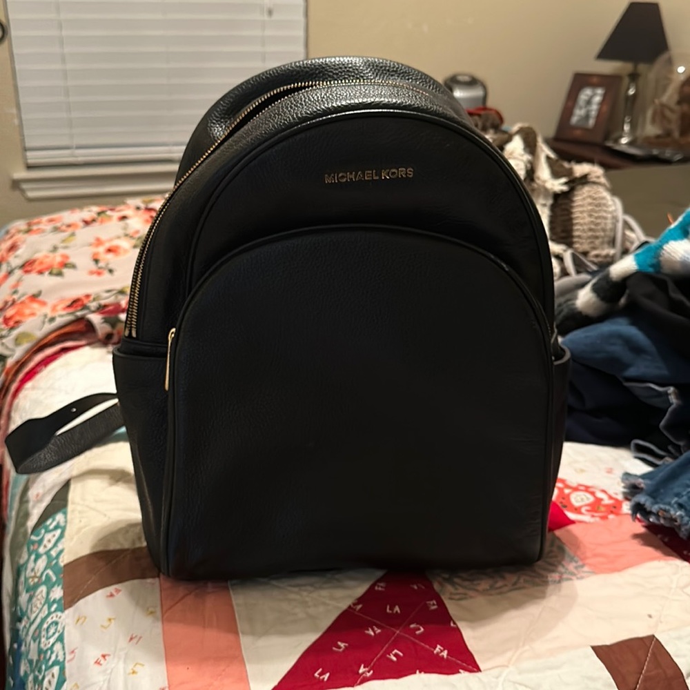 Black Leather Michael Kors Small Backpack that’s never been used!!